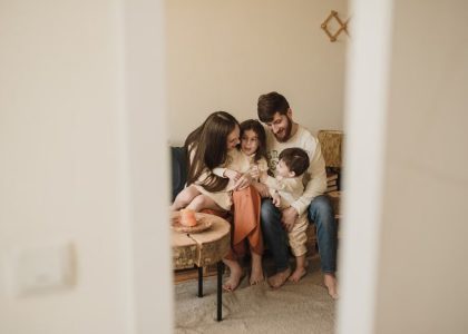 A loving family enjoying a warm, intimate moment together indoors.
